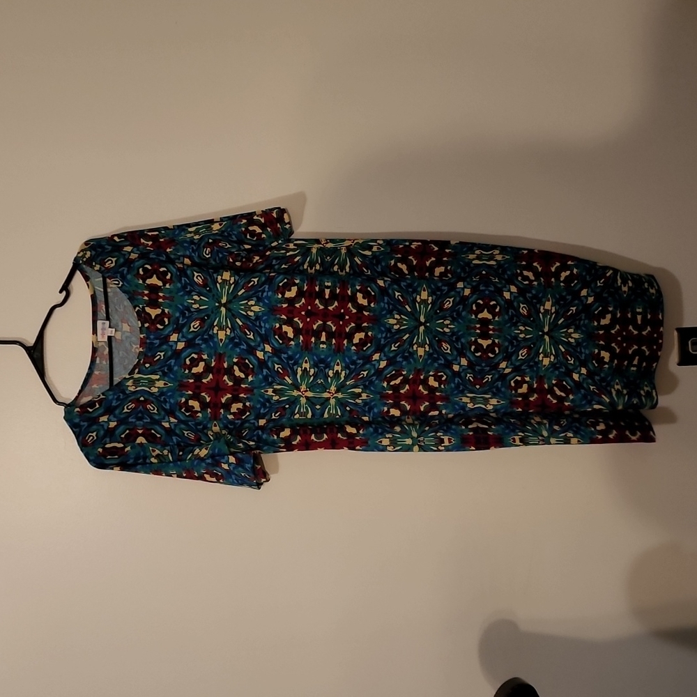 Lullaroe dress its never been worn. Size 2XL